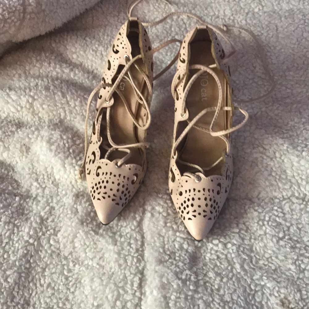 women lace up heels